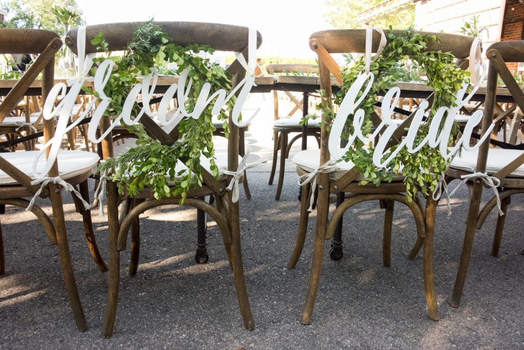 bride and groom sign