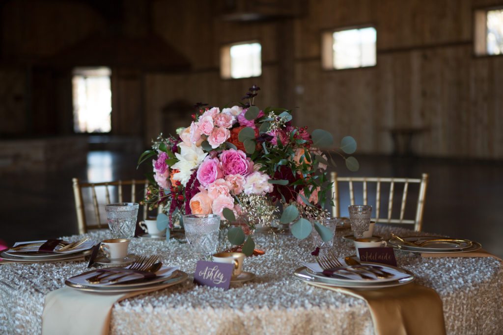 low and lush wedding centerpiece by denver wedding planner