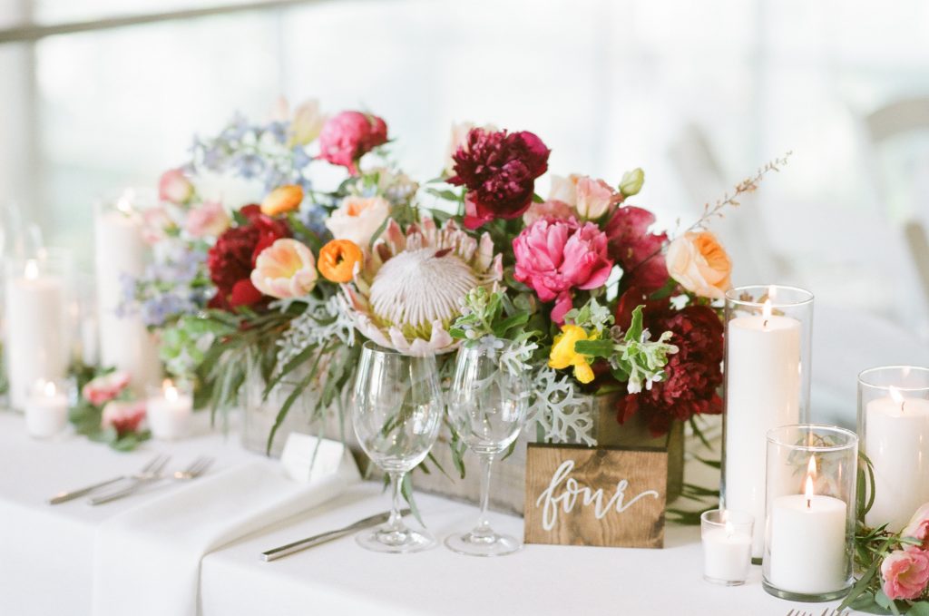 Gorgeous centerpiece and calligraphic table number.