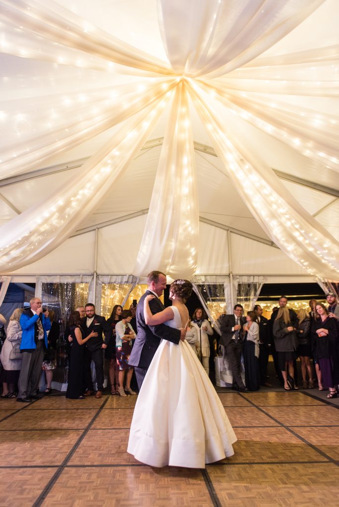 Father-Daughter dance under a beautifully drapped tentscape.