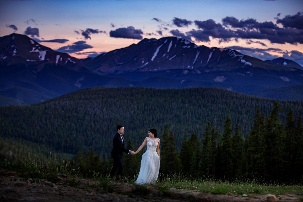 Pooneh & John with mountain backdrop at sunset