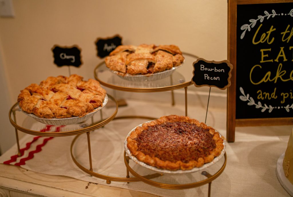 cherry pie, apple pie, and bourbon pecan pie as wedding desserts