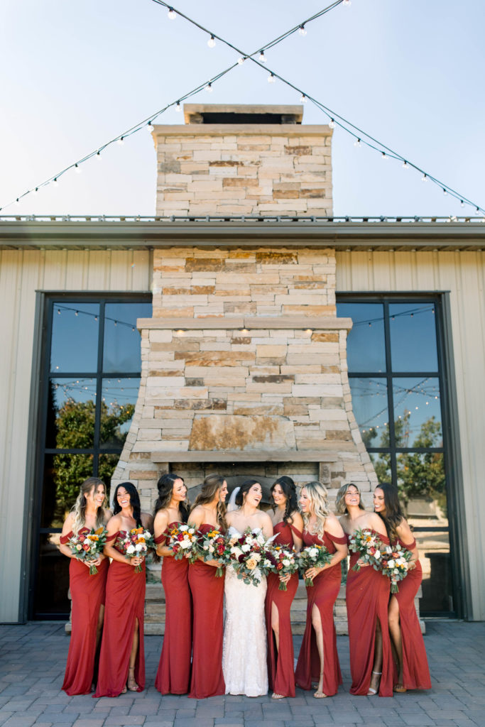 bridesmaids at spruce mountain ranch in fall colored bridesmaid dress